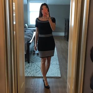 Black dress with white piping